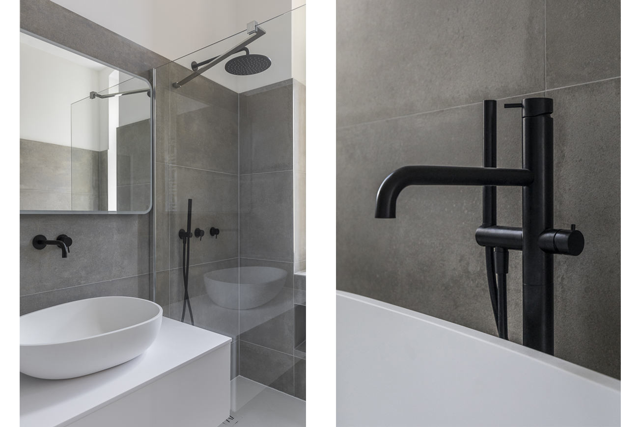 Modernes Badezimmer mit schwarzen Armaturen